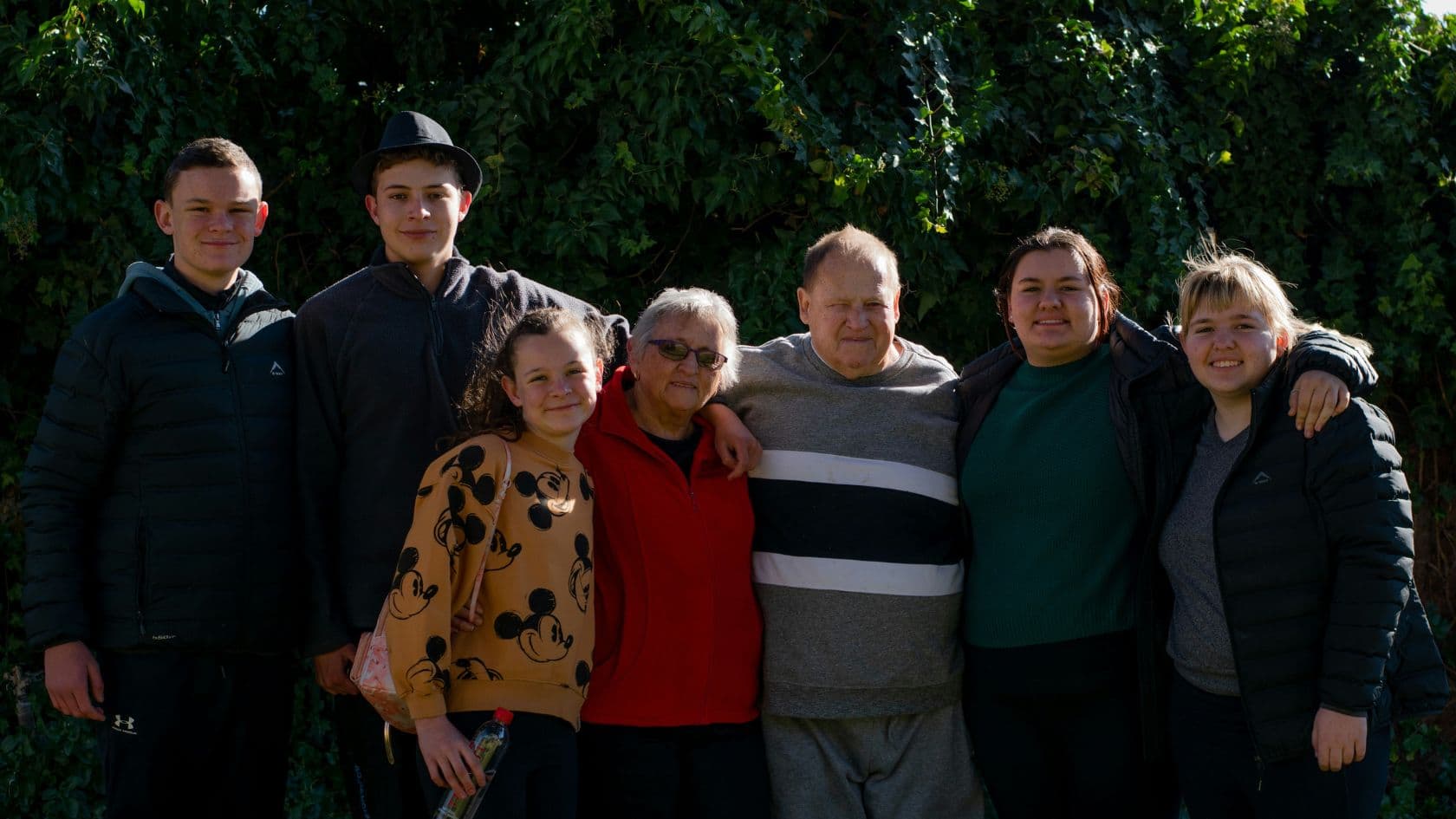 Multiple generations of a family spending time together in a Southern Nevada home.